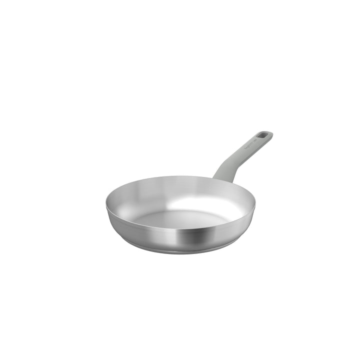 24 cm frying pan with a sleek silver surface and a light gray handle